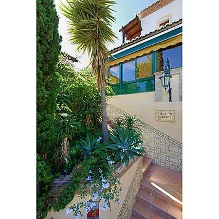 Roberto Canovas Villa *